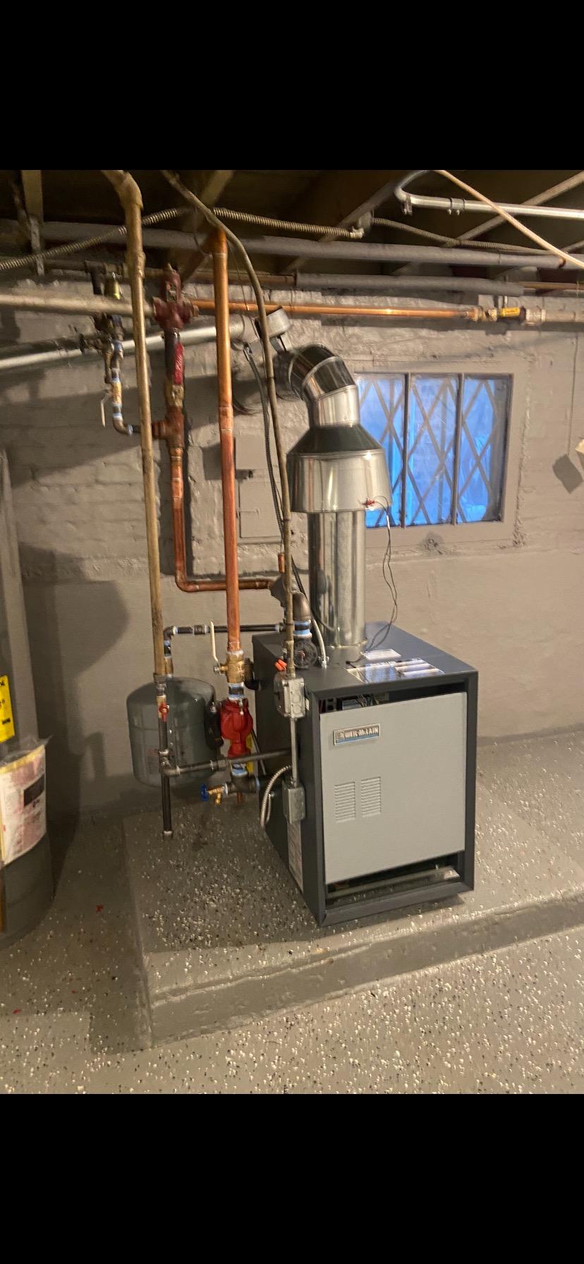 Weil-McLain boiler with copper piping serviced by ChillTech